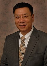Mr. Xiaofan  HOU
